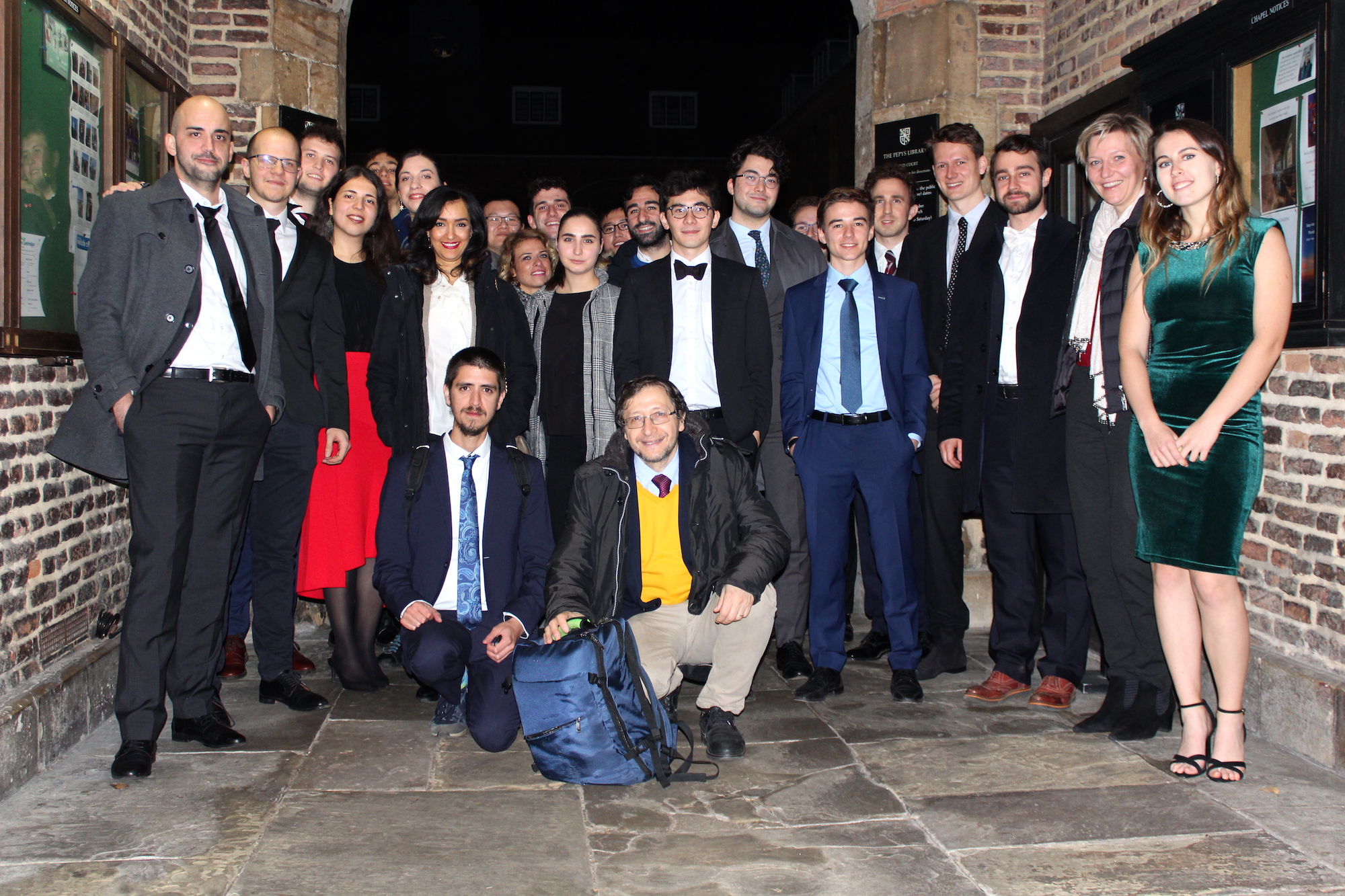 Members of the AI research group after formal dinner at Magdelene College, Cambridge.