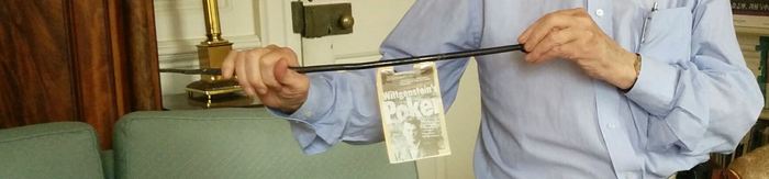 Alan with Wittgenstein’s poker pointing at Keynes’ wardrobe