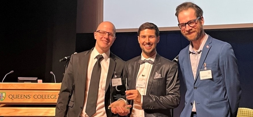 Dmitry Kazhdan and Botty Dimanov receive the Company Of The Year Award from Dr Carl Henrik Ek at the Hall of Fame Awards